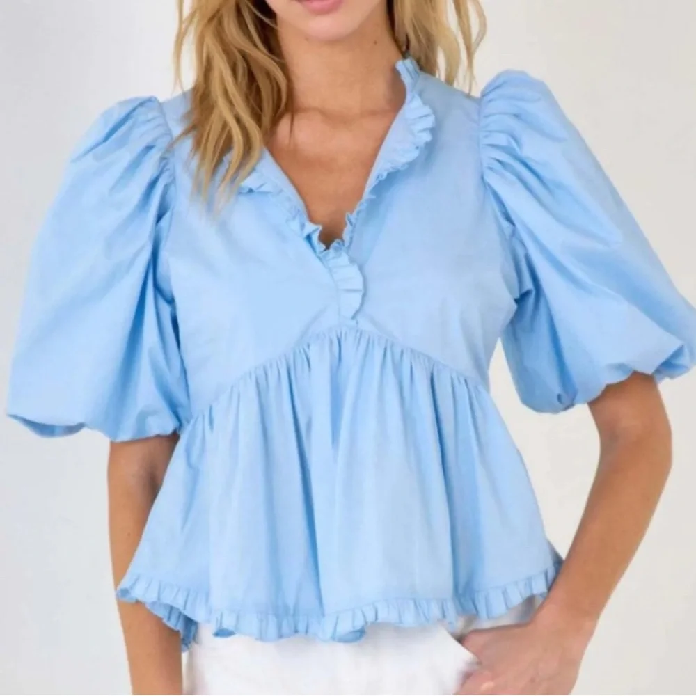 Anthropologie Puff sleeve Peplum Blouse light blue size L